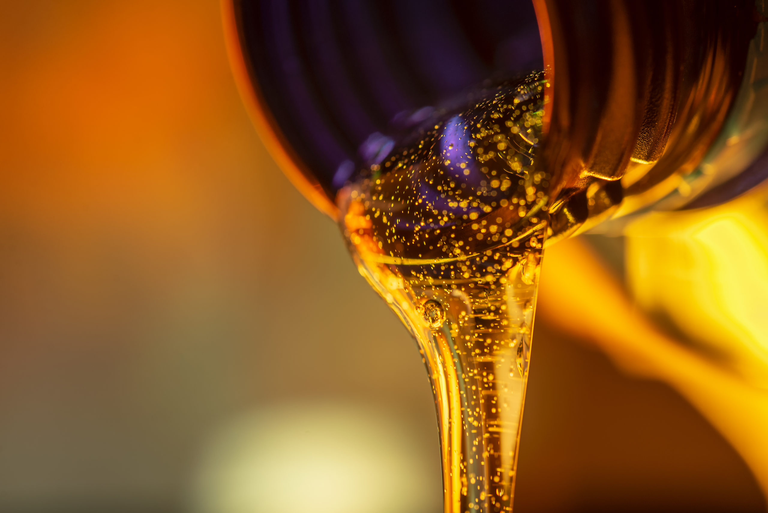 A bottle of oil is being poured